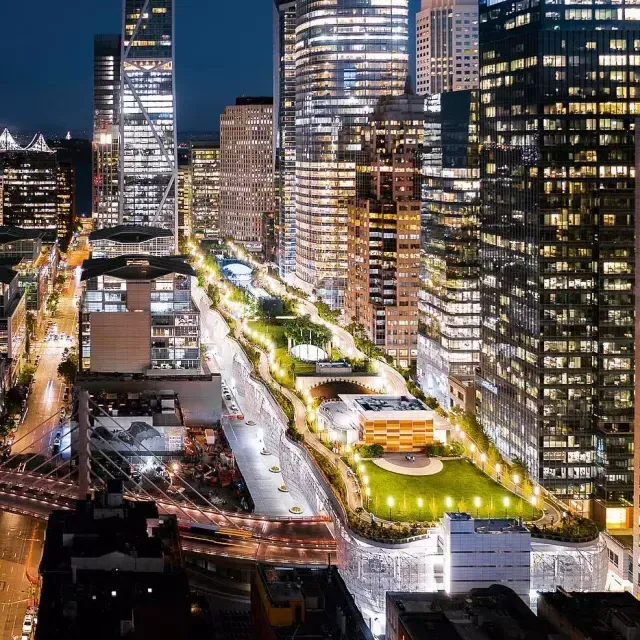 San Francisco's Salesforce Park lit up at night.